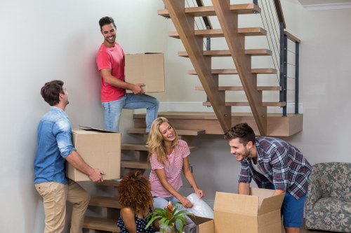 Professional packing services in Camdentown with carefully wrapped household items