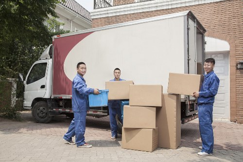 Packed boxes and protective wrapping prepared for flat removals in Camdentown
