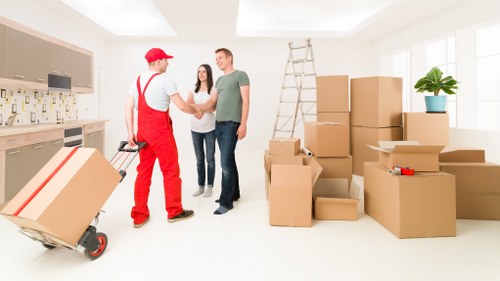 Office relocation with moving boxes and equipment