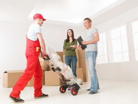 Local removal team helping with furniture in Camden Town