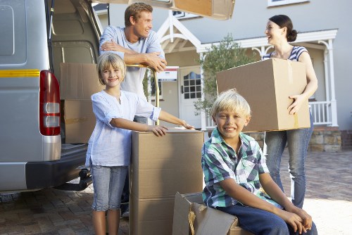 Safety-focused moving team planning a job before lifting